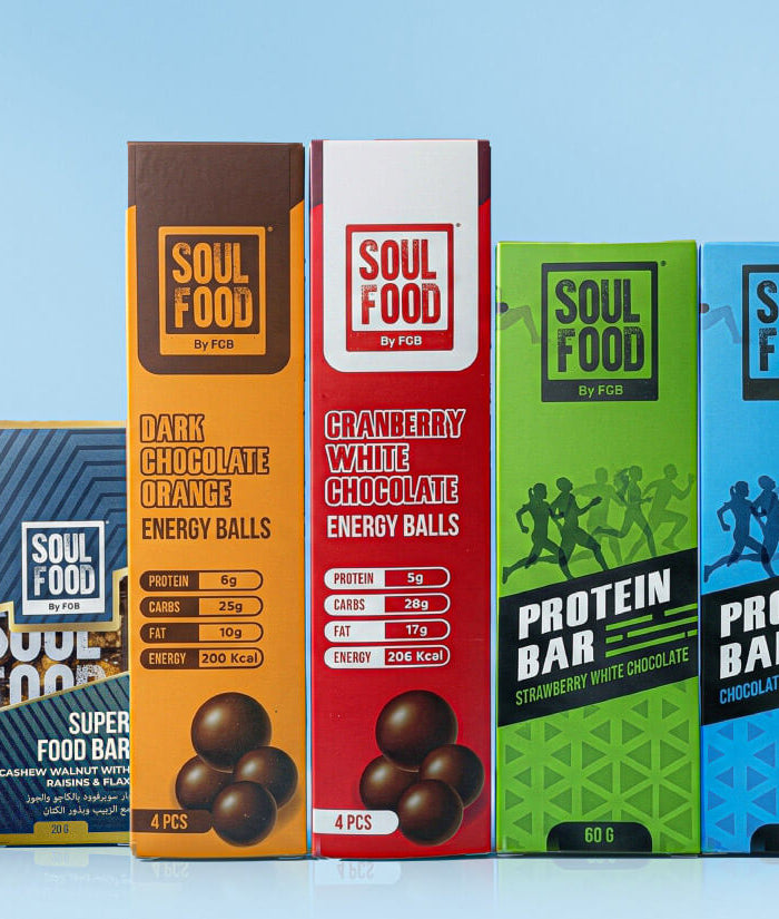 Row of Soul Food branded food products on a blue background. Soul Food is a brand of Flour Girl UAE Dubai Abu Dhabi.