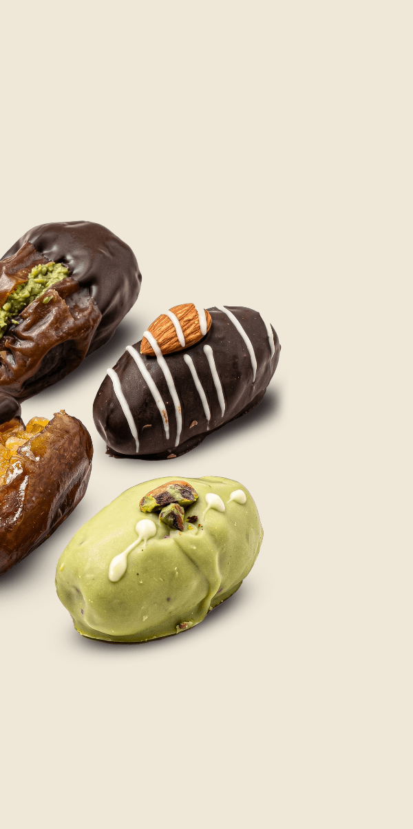 Dessert items with chocolate and green toppings on a beige background