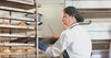 Flour Girl Bakeries team member preparing fresh bread for horeca and foodservice customers in the UAE